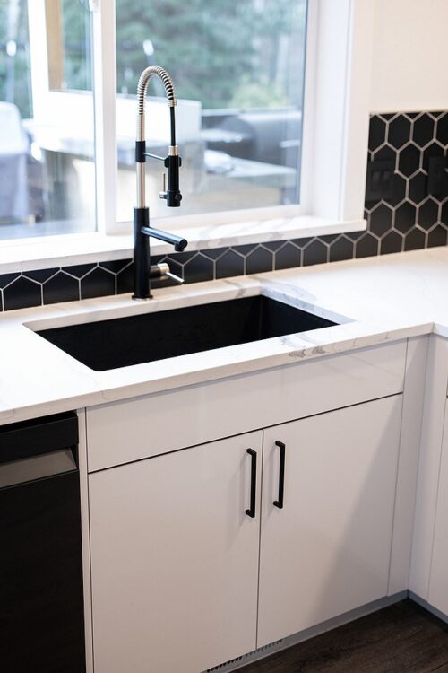 Black Backsplash with White Cabinets
