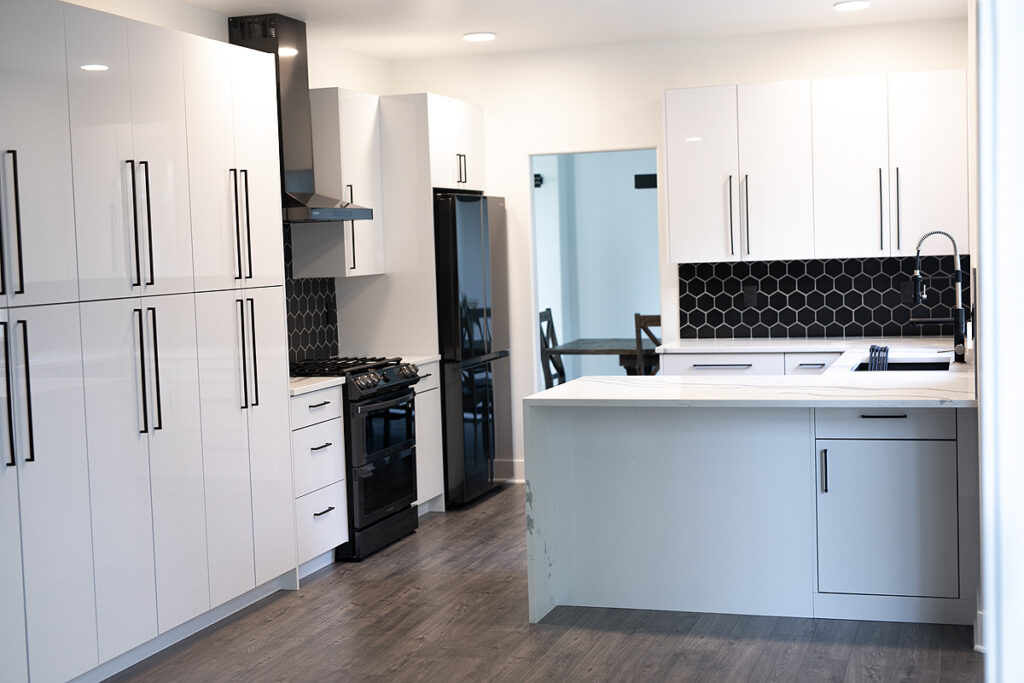 Black Backsplash White Cabinets