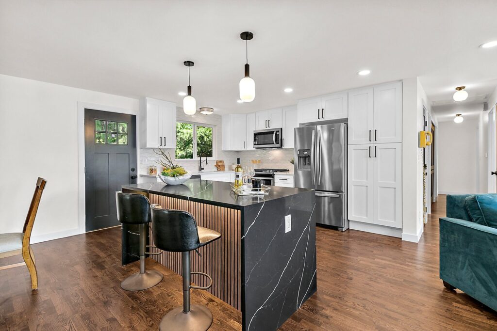 Pristine White Kitchen with Black and Brown Accents